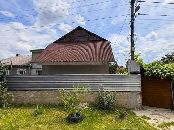 Квартира з окремим входом, автономним опаленням та ділянкою 2.5 сот - фото 1