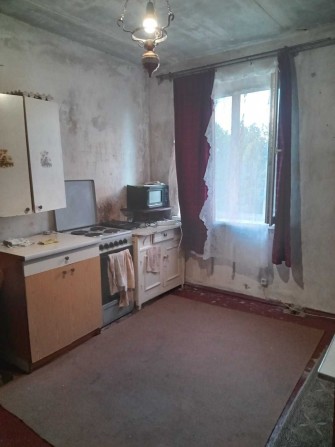 Продам 4-х комнатную квартиру в центре - фото 1