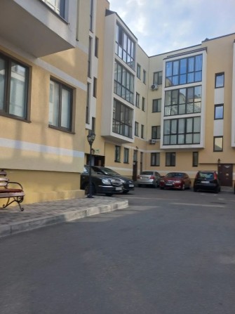 Квартира з двориком - фото 1