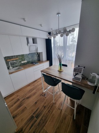 Двохкімнатна квартира з дизайнерським ремонтом - фото 1