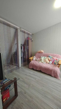 Продаж унікальної 1-кімнатної квартири з двома рівнями — 56 м² - фото 1