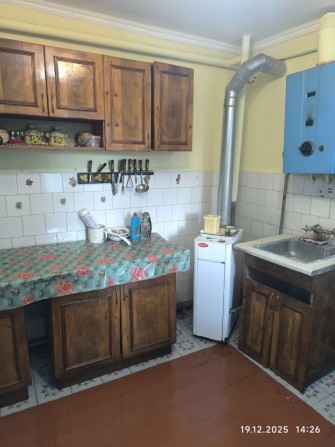 Квартира в будинку - фото 1