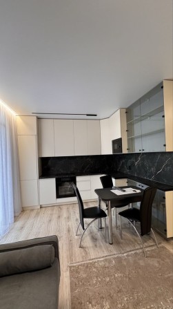 Продаж Нової 1,5 кімнатної квартири. Центр. - фото 1