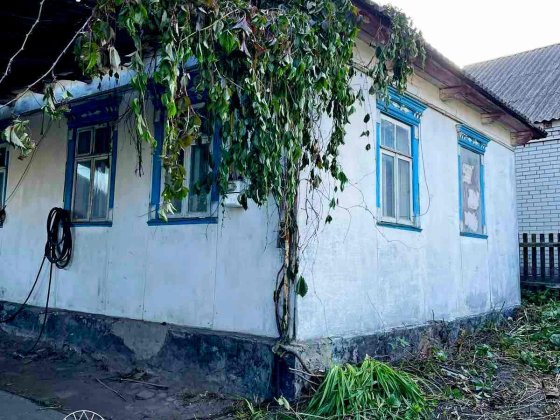 Півбудинку на Шевченка біля річки.Усі комунікації.5 соток. Белая Церковь