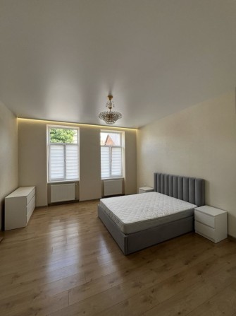 Оренда в центрі міста квартири з кухнею-студією - фото 1