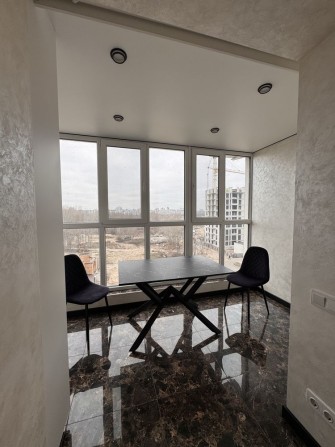 Класна квартира на Митниці в новобудові - фото 1