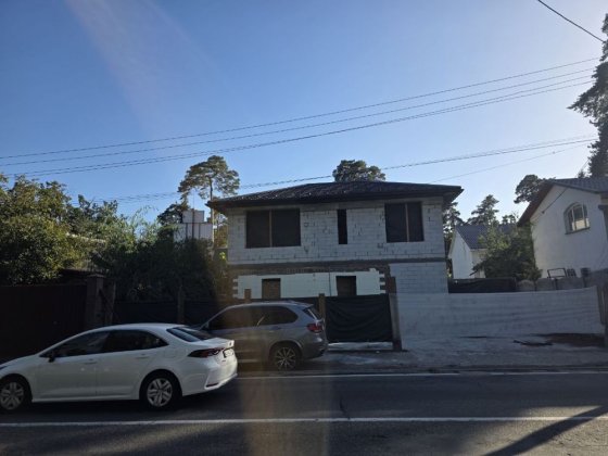 Комерця в Центр Бучі Новус ФАСАД Варшавської траси Буча