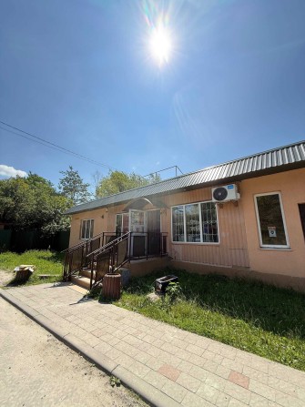 Продаж діючого комерційного приміщення з ділянкою в Зимній Воді - фото 1