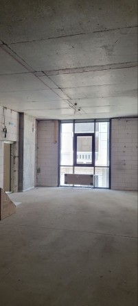 Небольшое помещение в центре города в новом доме - фото 1