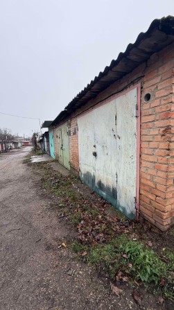 Выгодная цена — капитальный кирпичный гараж - фото 1