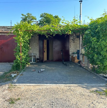 Продам гараж правый берег Арочный мост - фото 1