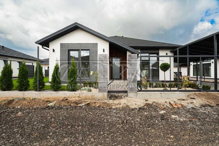 Продаж нового будинку в КМ с. Крюківщина, вул. Привітна, 1 - фото 1