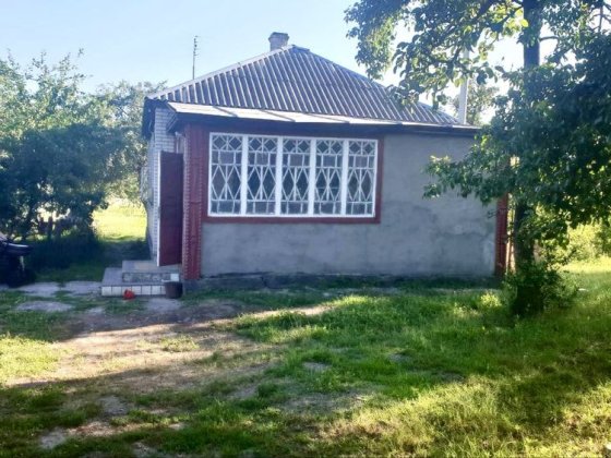 Продам 1/3 частку будинку з земельною ділянкою  с. Путрівка, Путровка