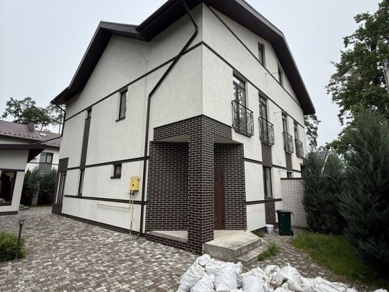 Продаж будинку Буча з сауною з ремонтом камін мансарда тепла підлога Буча