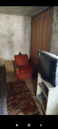 сдам флигель без удобств, туалет вода возле дома  1700 гр в месяц - фото 1