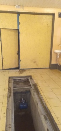 Гараж зі світлом, ямою та водою - фото 1