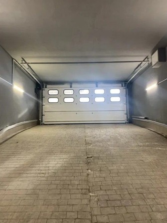 Сдам просторное  паркоместо в подземном паркинге ЖК 4 СЕЗОНА - фото 1