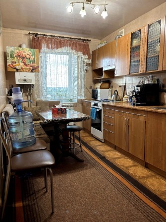 Продається 4-кімнатна квартира з автономним опаленням в м.Ізюм - фото 1