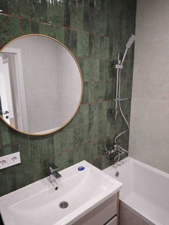 Продаж 2-к квартири 64 м² з ремонтом та меблями - фото 1