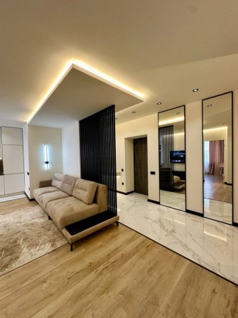 Стильна квартира в центральній частині міста - фото 1