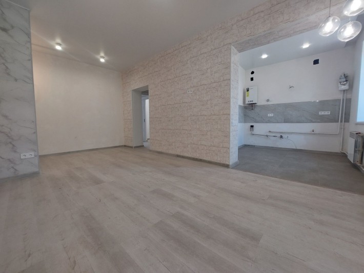 Двохкімнатна квартира студіо в центрі міста, 95-й квартал - фото 1