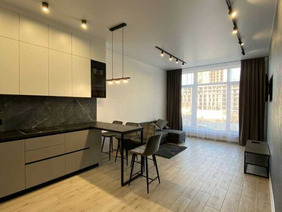 Продаж квартири в новобудові кухня-студіо і спальня Львів