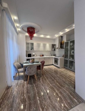 Продам 123 кв.м з дизайнерським ремонтом у ЖК Пори Року.Кудряшова 16 - фото 1