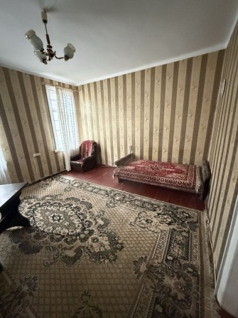 Кімната в трикімнатній - фото 1