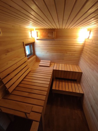 Подобово дерев'яний будинок з сауною. - фото 1