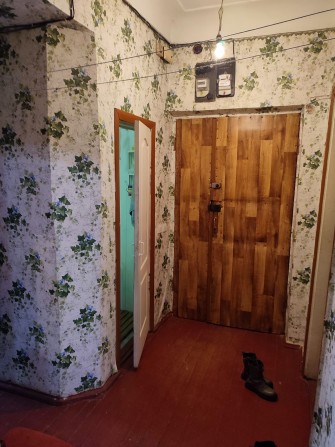 Квартира 2 кімнати на першому поверсі,зі спільною кухнею. - фото 1