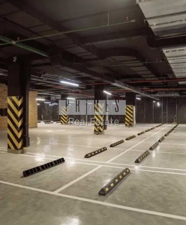 Продажа парковочного места 13,4 м2, ЖК TRIIINITY, ул. Тютюнника, 39а - фото 1