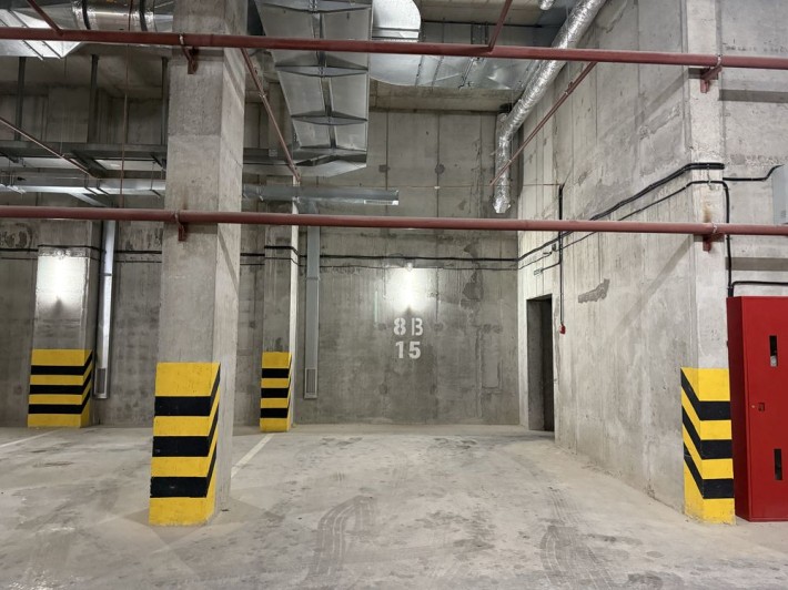 Паркінг Рудненська Ріел Сіті підземний гараж паркомісце парковка крита - фото 1