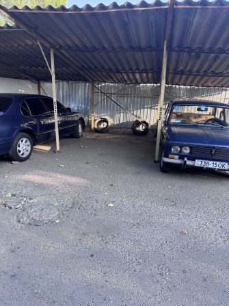 Продам место на стоянке ул. Радостная - фото 1