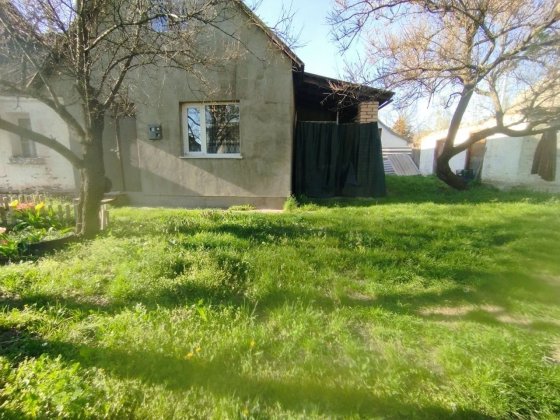 Половина будинку та земельна ділянка Васильків