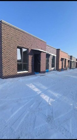 Одноповерховий танхаус 62 кв.м. в м. Гостомель. - фото 1