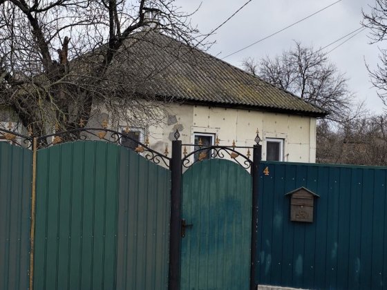 Продам 1/2 частину будинку з земельною ділянкою. М. Лебедин , 