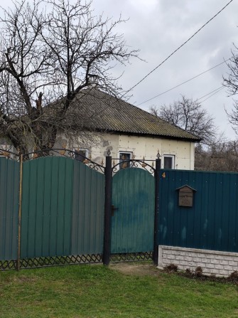 Продам 1/2 частину будинку з земельною ділянкою. М. Лебедин , - фото 1