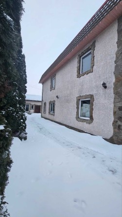 частина двоповерхового будинку в центральній частині міста - фото 1