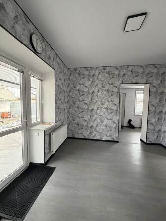 Продам дом с ремонтом в городе - фото 1