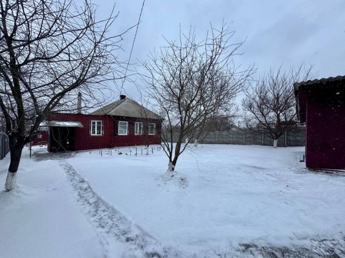 Продається будинок з гаражем деревяний обкладений цеглою вул. Київська - фото 1