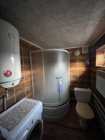 Продам хороший дом с гаражом п.Былбасовка - фото 1