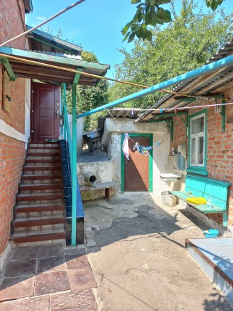 Продам добротный дом в Чугуеве - фото 1