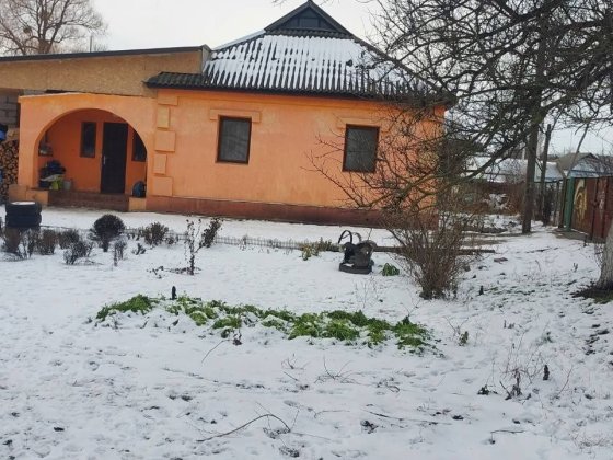 Будинок під держпрограми над річкою. Погребище Погребище