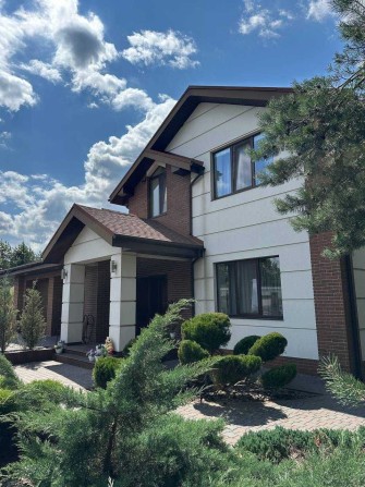 Сучасний будинок біля лісу в Обухівці - фото 1