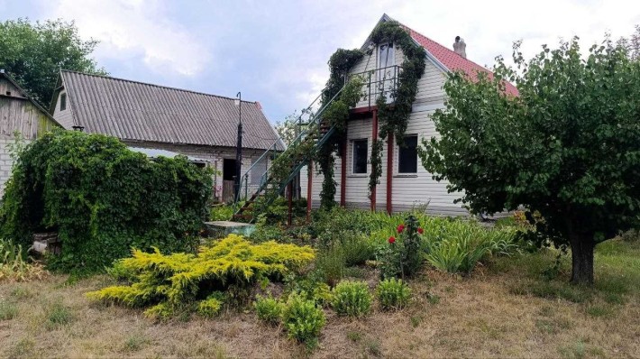 Продам дом в Подгородном с отличным участком - фото 1