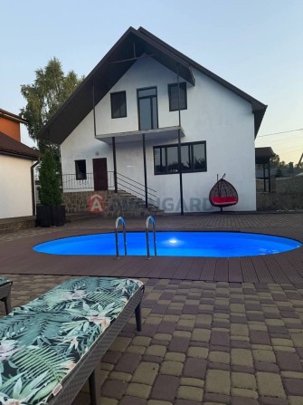 Продам дом 200 м2 с бассейном и баней в начале Обуховки. - фото 1