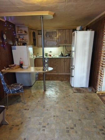 Продам половину будинку центр м. Чуднів - фото 1