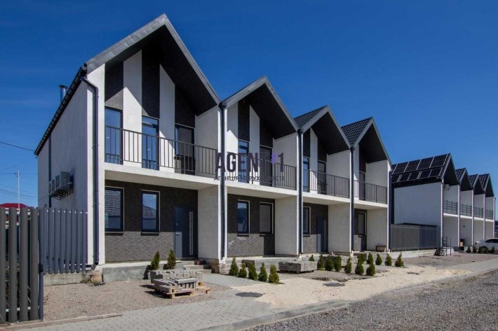 Продається сучасний таунхаус 80 кв.м.  с. Святопетрівське. - фото 1