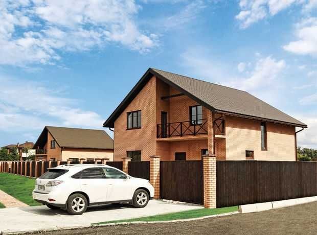 Сучасний котедж під Києвом з великою терасою та ділянкою - фото 1