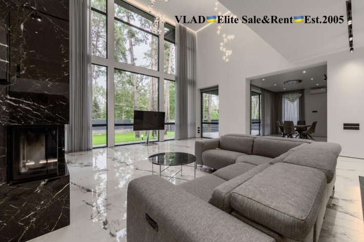 Конча-Заспа. Козин. Плюти. Новий сучасний будинок в лісовій частині. - фото 1